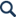 Magnifying glass icon.