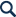 Magnifying glass icon.
