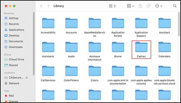 Library interface with the Caches folder indicated.